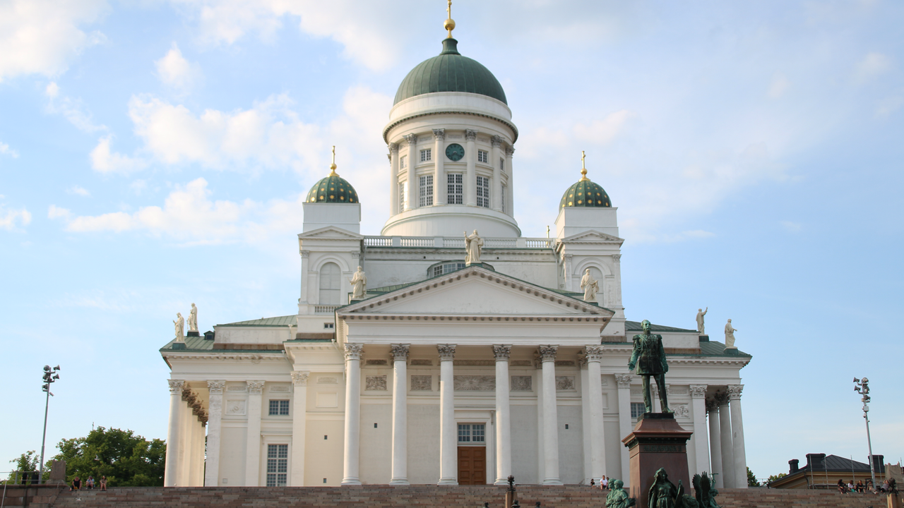Stunning view of Helsinki Cathedral with a clear blue sky, highlighting its elegant architecture.